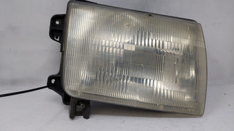 compare product 2000-2001 Nissan Xterra Passenger Right Oem Head Light Headlight Lamp