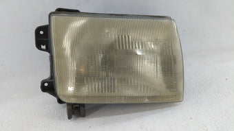 compare product 2000-2001 Nissan Xterra Driver Left Oem Head Light Headlight Lamp