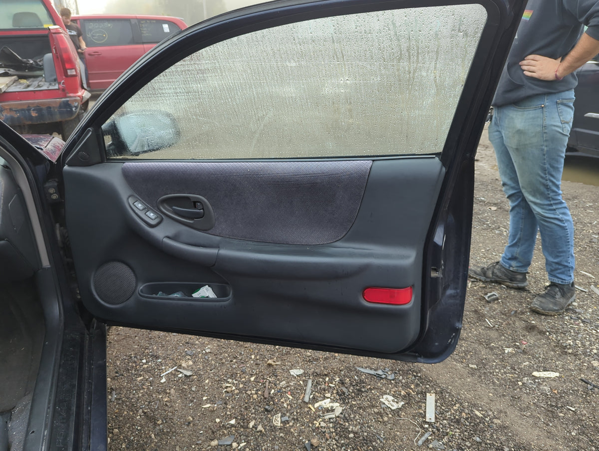 2001 Pontiac Grand Prix Front Right Passenger Interior Door Panel Trim - Oemusedautoparts1.com