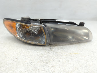 compare product 1997 Pontiac Grand Prix Passenger Right Oem Head Light Headlight Lamp