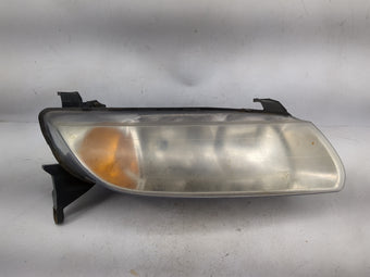 compare product Saturn L Series Passenger Right Oem Head Light Headlight Lamp