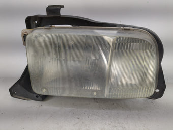 compare product 1999-2004 Chevrolet Tracker Driver Left Oem Head Light Headlight Lamp