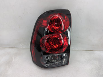 2002-2009 Chevrolet Trailblazer Tail Light Assembly Driver Left OEM Fits Fits 2002 2003 2004 2005 2006 2007 2008 2009 OEM Us