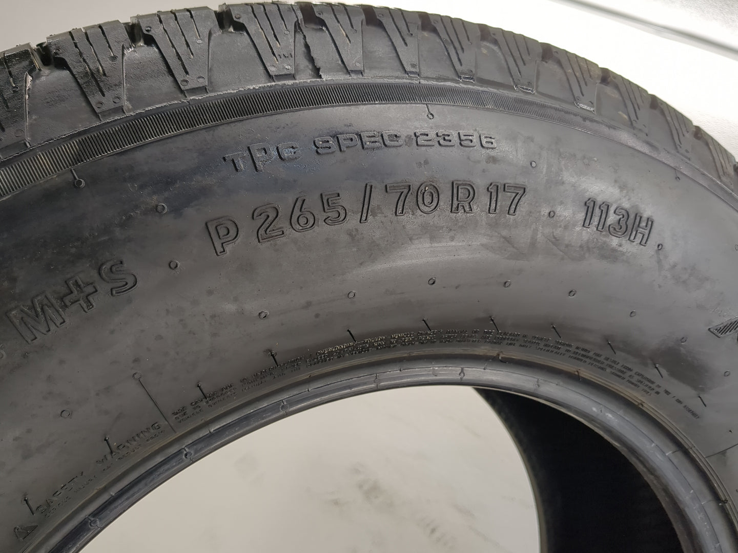Used Tire P265/70R17 GENERAL AMERITRAC 113H - Tread Depth 15/32 - Oemusedautoparts1.com