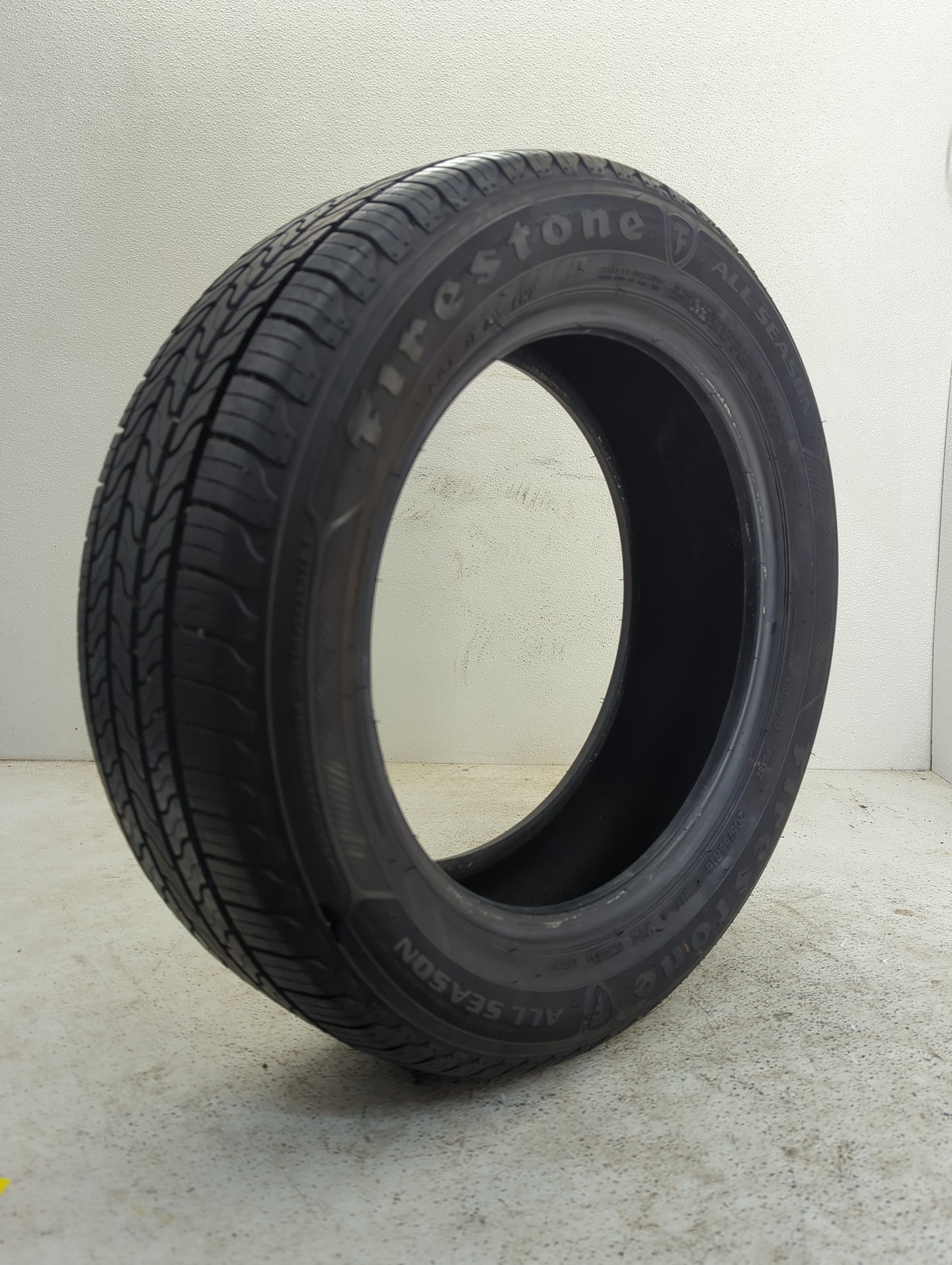Used Tire 205/55R16 FIRESTONE ALL SEASON 91T - Tread Depth 8/32 - Oemusedautoparts1.com