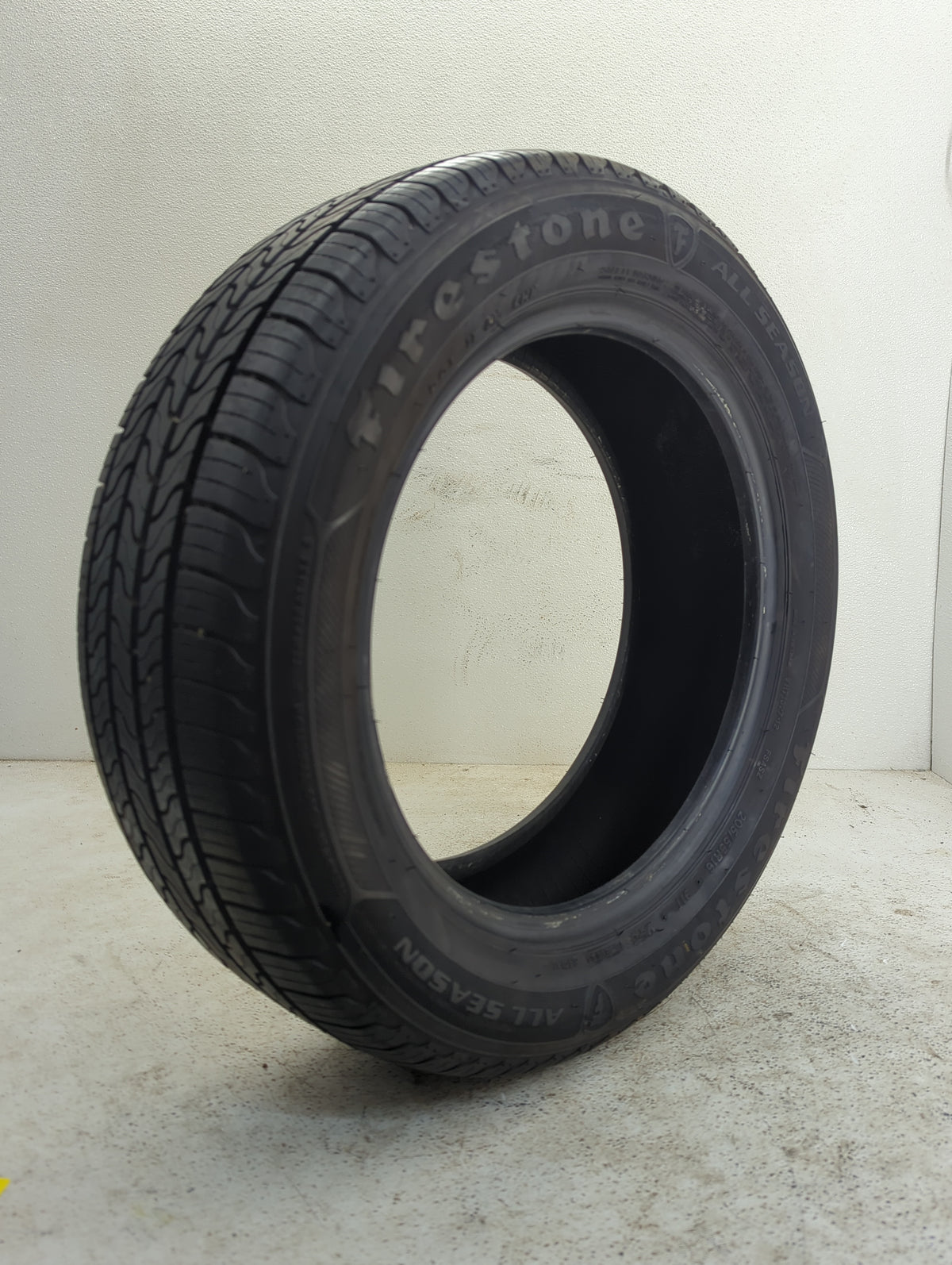 Used Tire 205/55R16 FIRESTONE ALL SEASON 91T - Tread Depth 8/32 - Oemusedautoparts1.com