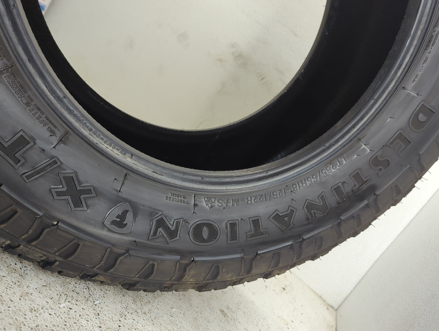 Used Tire LT285/65R18 FIRESTONE DESTINATION X/T 125/122R - Tread Depth 11.5/32 - Oemusedautoparts1.com
