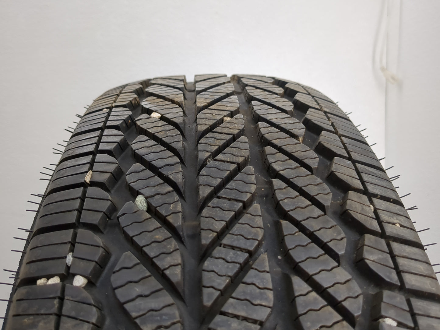 Used Tire 225/65R17 BRIDGESTONE WEATHERPEAK 102H - Tread Depth 10/32 - Oemusedautoparts1.com
