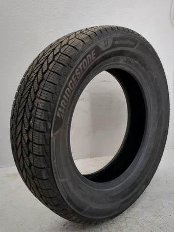 compare product Used Tire 225/65R17 BRIDGESTONE WEATHERPEAK 102H - Tread Depth 10/32