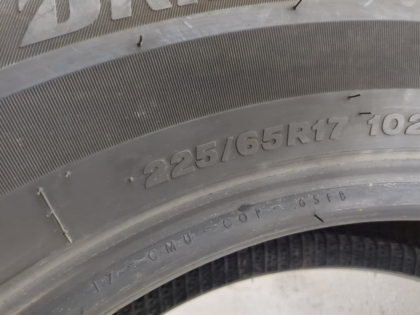 Used Tire 225/65R17 BRIDGESTONE WEATHERPEAK 102H - Tread Depth 10/32 - Oemusedautoparts1.com
