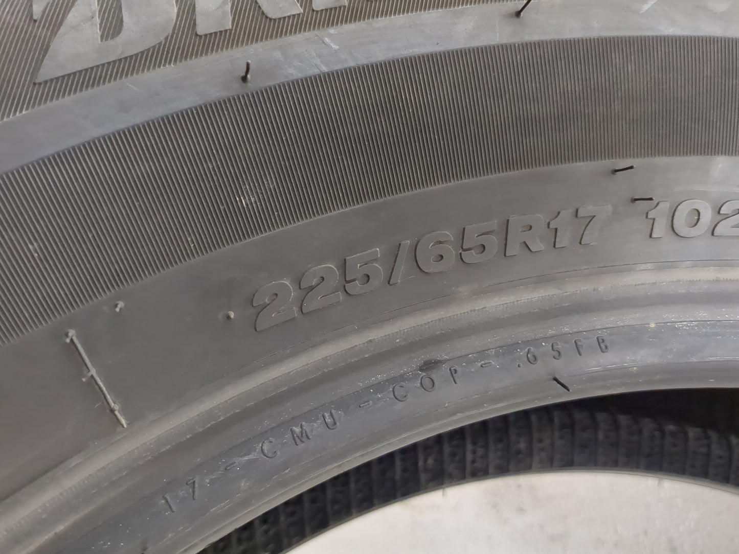 Used Tire 225/65R17 BRIDGESTONE WEATHERPEAK 102H - Tread Depth 10/32 - Oemusedautoparts1.com