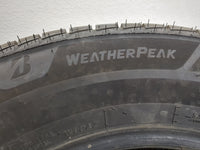 Used Tire 225/65R17 BRIDGESTONE WEATHERPEAK 102H - Tread Depth 10/32 - Oemusedautoparts1.com