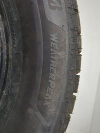 Used Tire 225/65R17 BRIDGESTONE WEATHERPEAK 102H - Tread Depth 10/32 - Oemusedautoparts1.com
