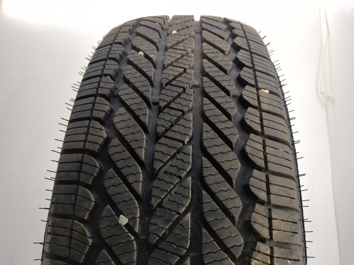Used Tire 225/65R17 BRIDGESTONE WEATHERPEAK 102H - Tread Depth 10/32 - Oemusedautoparts1.com