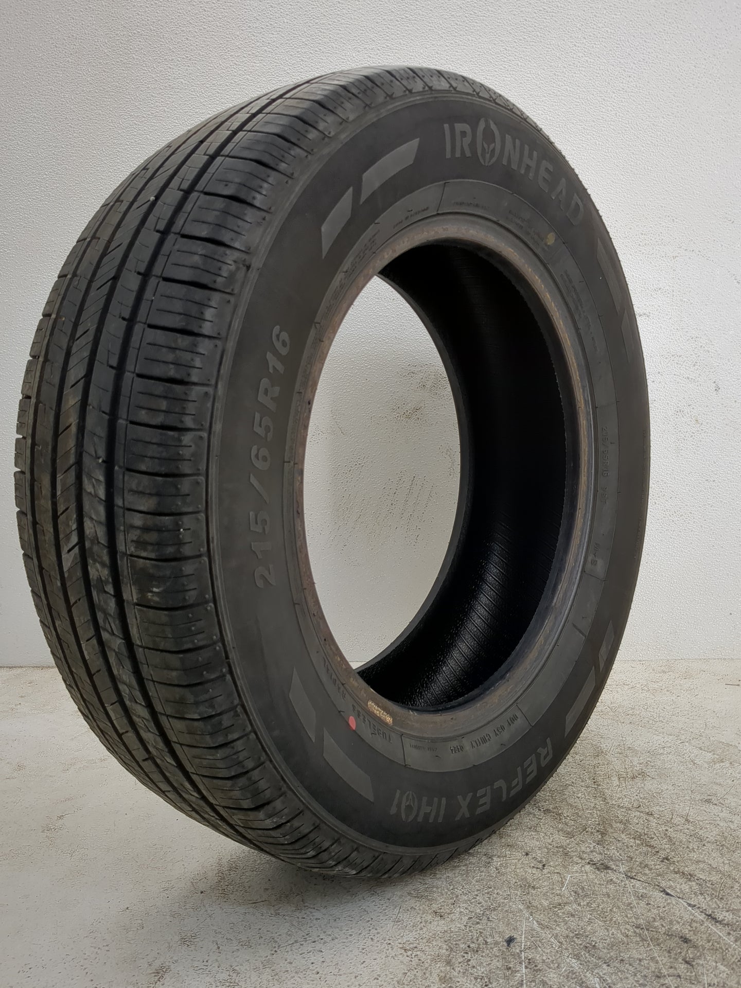 Used Tire 215/65R16 IRONHEAD REFLEX IHO1 98T - Tread Depth 7/32 - Oemusedautoparts1.com