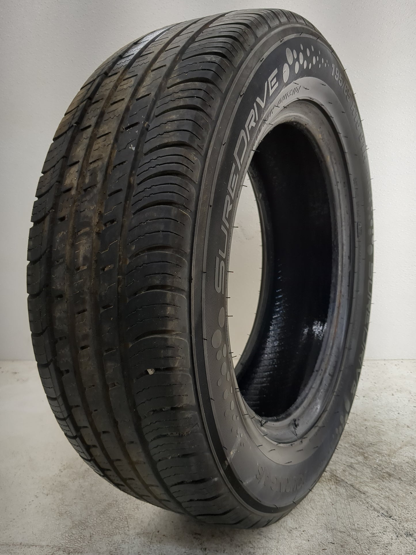 Used Tire 195/65R15 SUREDRIVE TOURING A/S 91H - Tread Depth 9/32 - Oemusedautoparts1.com
