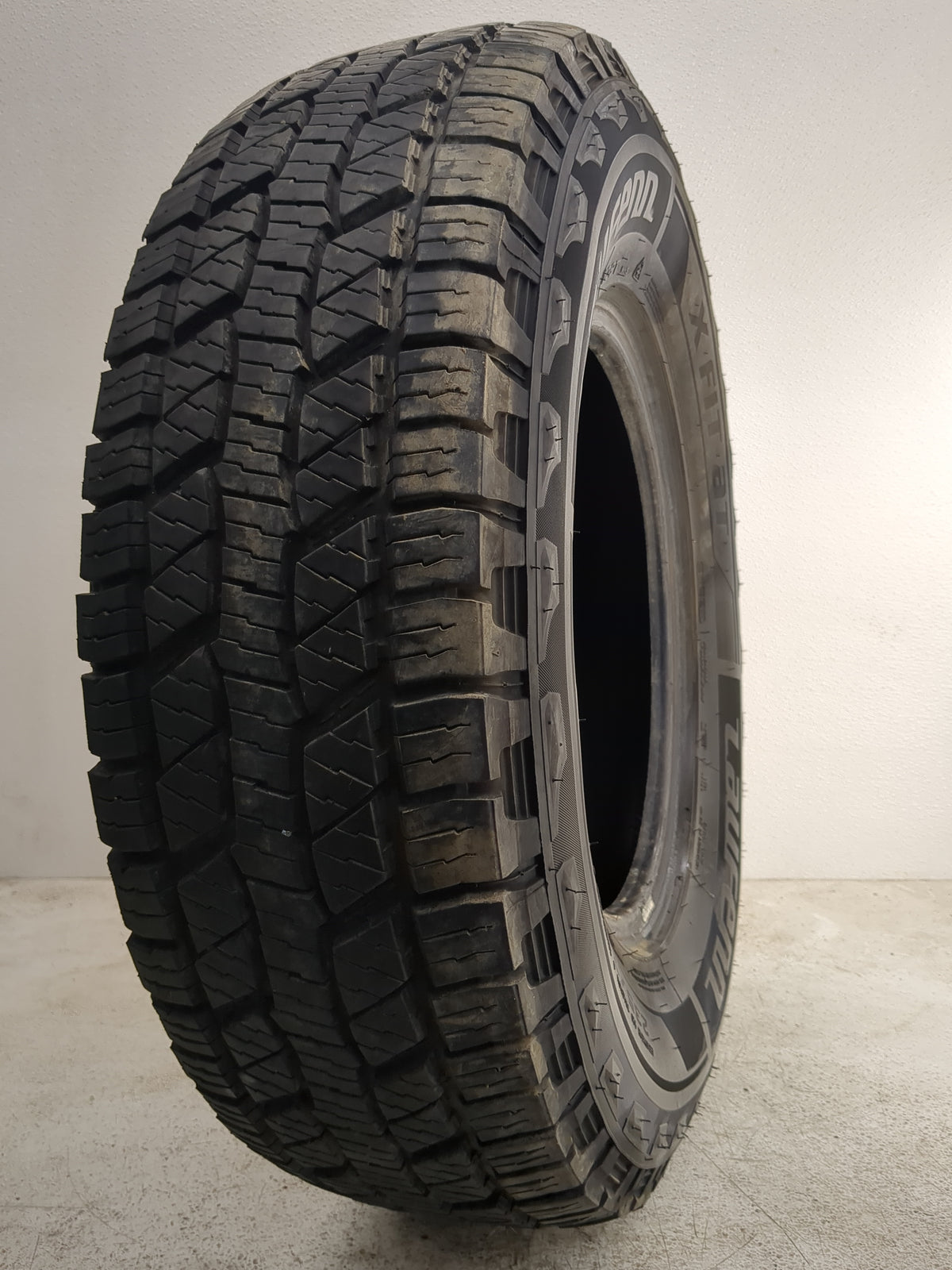 Used Tire 235/75R15 LAUFENN X FIT AT 109T - Tread Depth 12.5/32 - Oemusedautoparts1.com