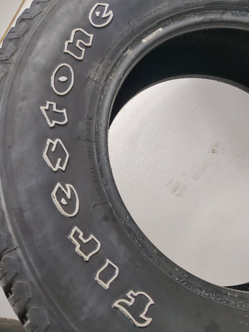 Used Tire 265/70R17 FIRESTONE TRANSFORCE AT 115T - Tread Depth 8/32