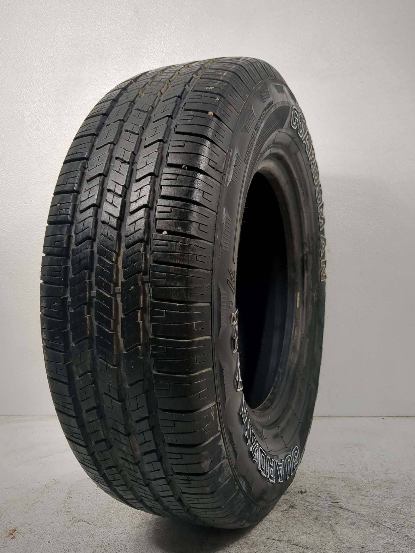 Used Tire 235/70R15 GUARDSMAN RADIAL H/T 102S - Tread Depth 7.5/32 - Oemusedautoparts1.com
