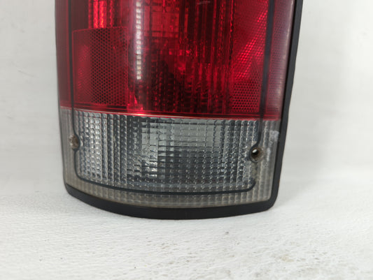 1995-2004 Ford E-150 Tail Light Assembly Driver Left OEM P/N:F7UB-13441-AA Fits OEM Used Auto Parts