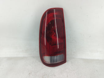 compare product 1997-2004 Ford F-150 Tail Light Assembly Driver Left OEM P/N:F47B Fits Fits 1997 1998 1999 2000 2001 2002 2003 2004 2005 2006 2007 OEM Used Auto Parts