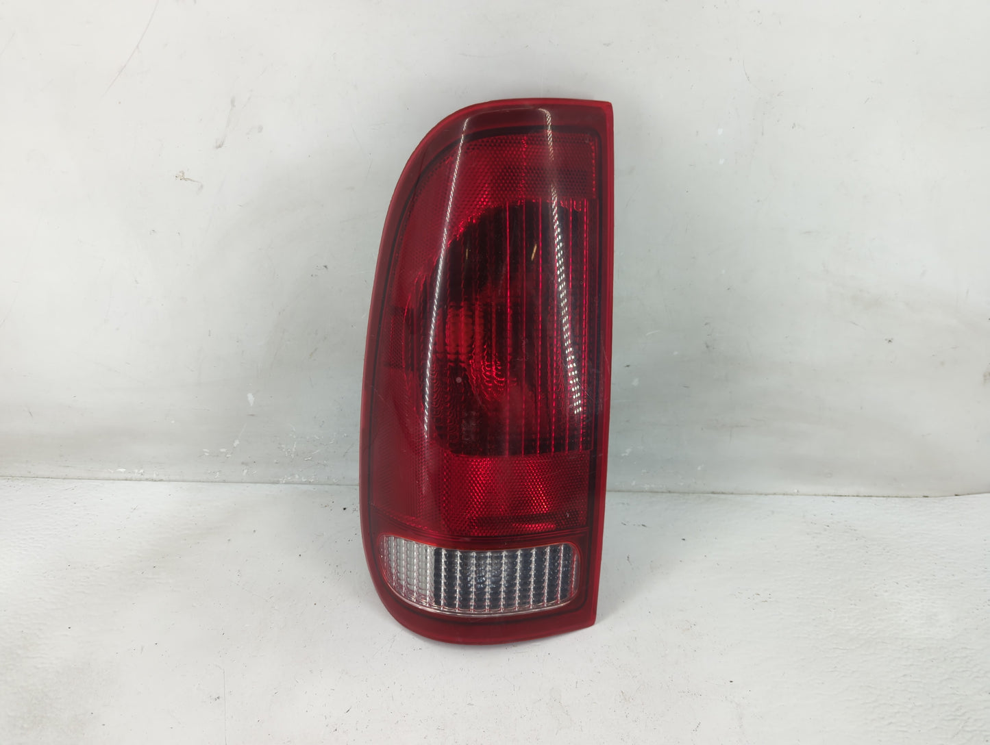 2002 Ford F-150 Tail Light Assembly Driver Left OEM P/N:F85B-13B505-0 Fits OEM Used Auto Parts - Oemusedautoparts1.com
