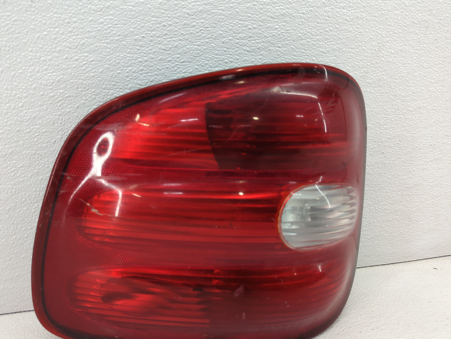 2002 Ford F-150 Tail Light Assembly Driver Left OEM P/N:F75B-13B505-B Fits OEM Used Auto Parts - Oemusedautoparts1.com