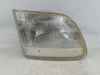 compare product 1997-2003 Ford F-150 Passenger Right Oem Head Light Headlight Lamp