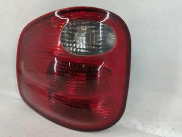 2000-2004 Ford F-150 Tail Light Assembly Driver Left OEM P/N:YL3X-13441-A 44ZH-1499A Fits Fits 2000 2001 2002 2003 2004 OEM Used Auto Parts