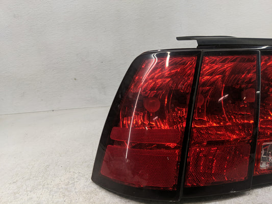1999-2004 Ford Mustang Tail Light Assembly Driver Left OEM Fits Fits 1999 2000 2001 2002 2003 2004 OEM Used Auto Parts