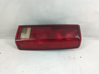compare product 1985-2005 Gmc Safari Tail Light Assembly Passenger Right OEM P/N:16502448 Fits OEM Used Auto Parts