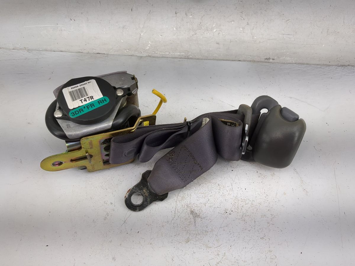 2000-2006 Hyundai Accent Passenger Front Seatbelt Retractor Gray - Oemusedautoparts1.com