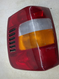 2002 Jeep Grand Cherokee Tail Light Assembly Passenger Right OEM P/N:333-1925R-AF Fits OEM Used Auto Parts - Oemusedautopart