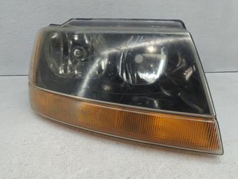 compare product 1999 Jeep Grand Cherokee Passenger Right Oem Head Light Headlight Lamp