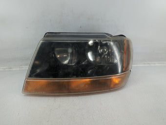 compare product 1999 Jeep Grand Cherokee Passenger Right Oem Head Light Headlight Lamp