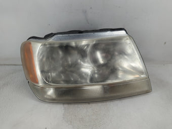 compare product 1999-2004 Jeep Grand Cherokee Driver Left Oem Head Light Headlight Lamp