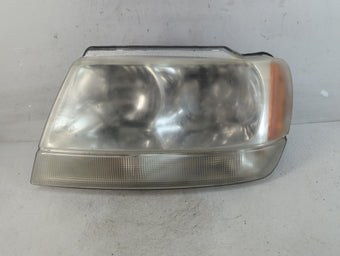 compare product 2002 Jeep Grand Cherokee Passenger Right Oem Head Light Headlight Lamp