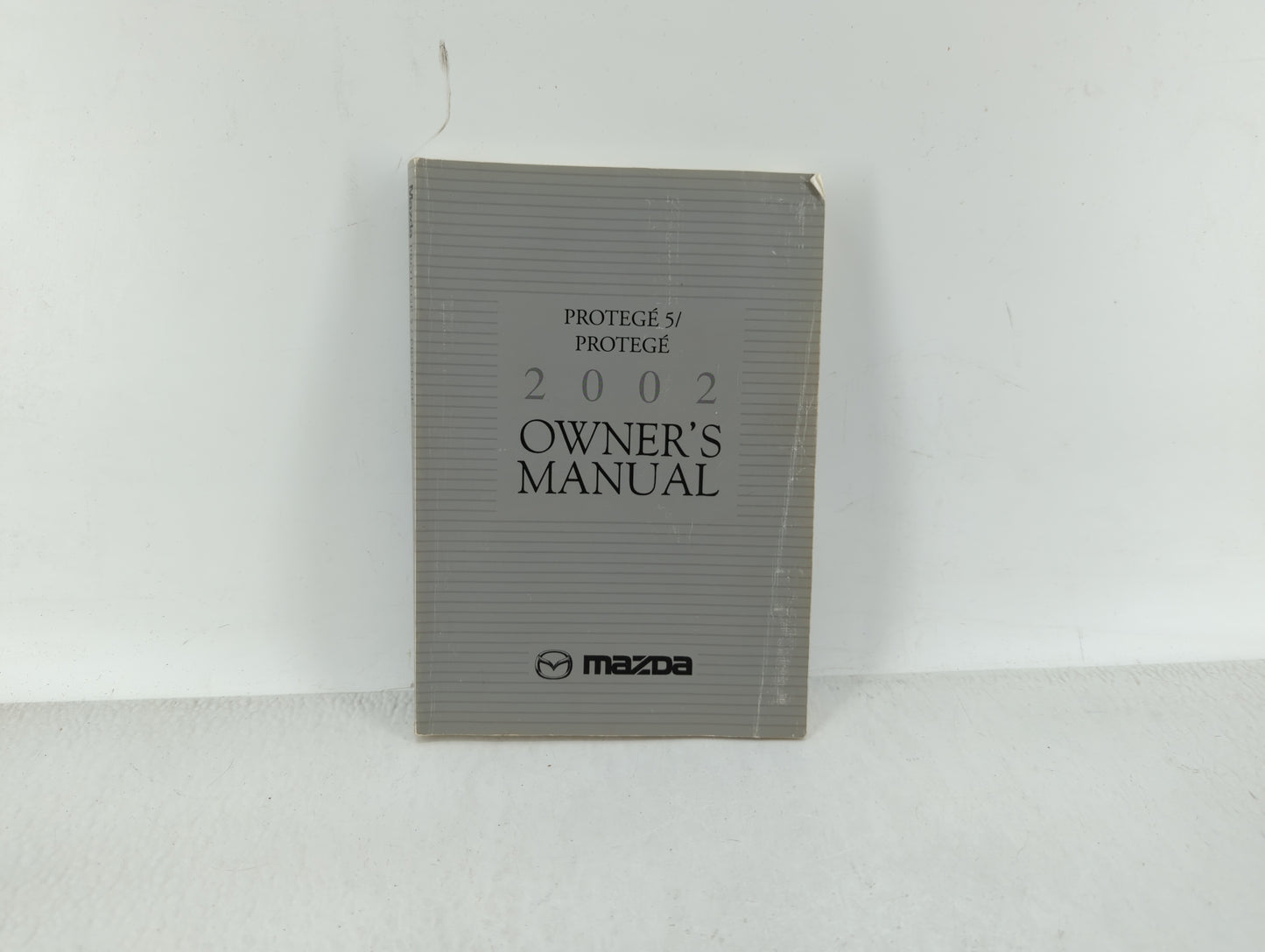 2002 Mazda Protege Owners Manual Book Guide OEM Used Auto Parts - Oemusedautoparts1.com