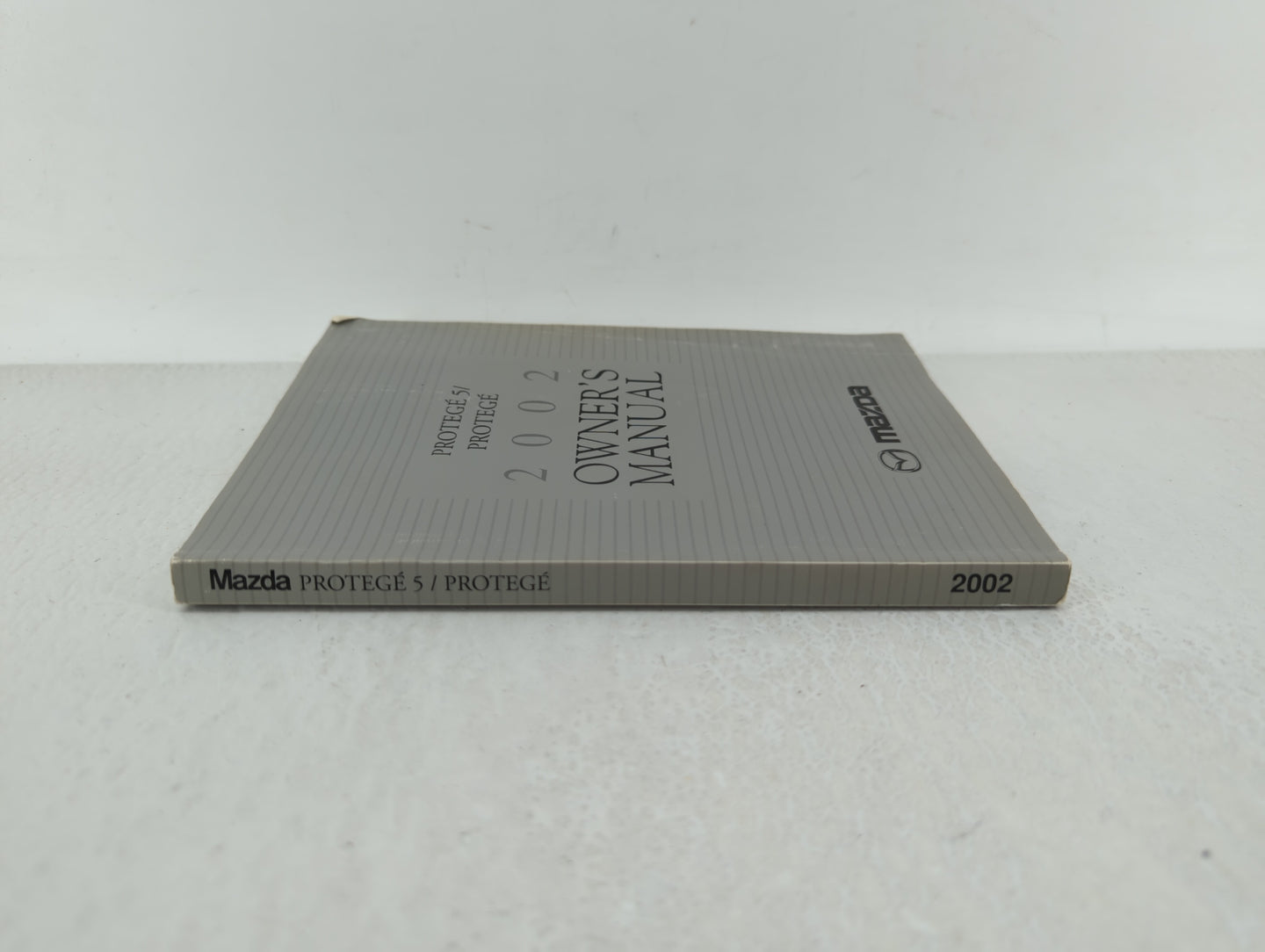 2002 Mazda Protege Owners Manual Book Guide OEM Used Auto Parts - Oemusedautoparts1.com