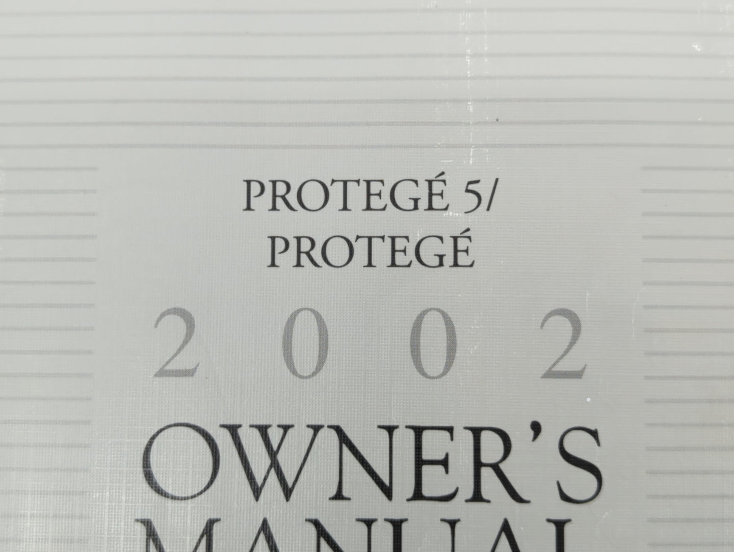 2002 Mazda Protege Owners Manual Book Guide OEM Used Auto Parts - Oemusedautoparts1.com