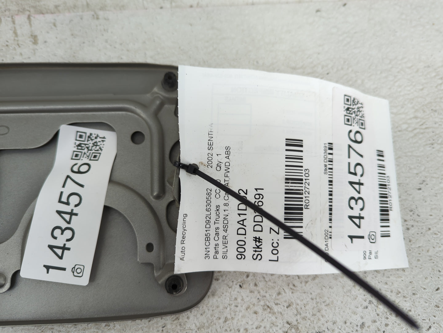 2002 Nissan Sentra Fuel Tank Door Lid Gas Tank Silver - Oemusedautoparts1.com