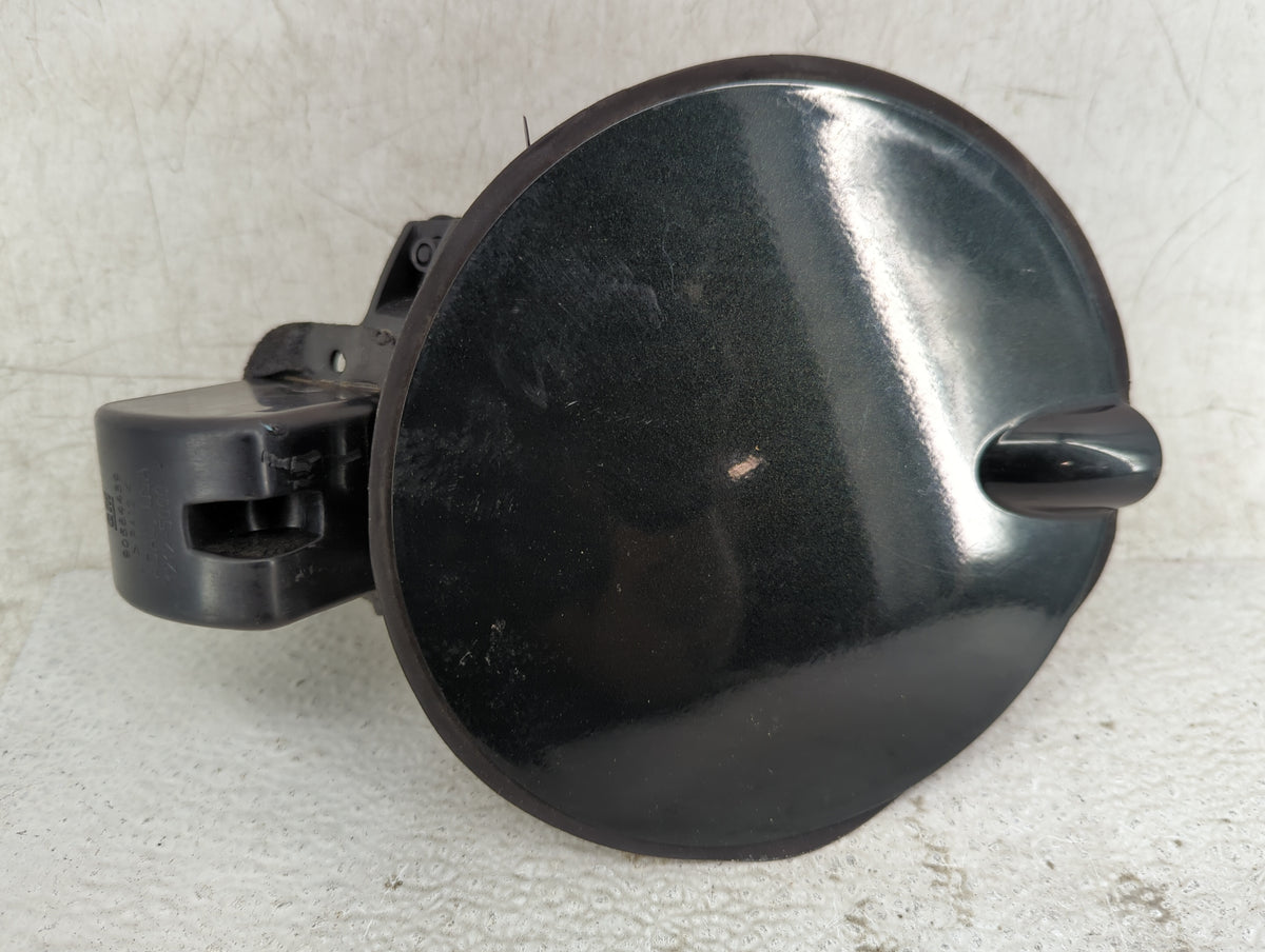 2002 Saturn L300 Fuel Tank Door Lid Gas Tank Black - Oemusedautoparts1.com