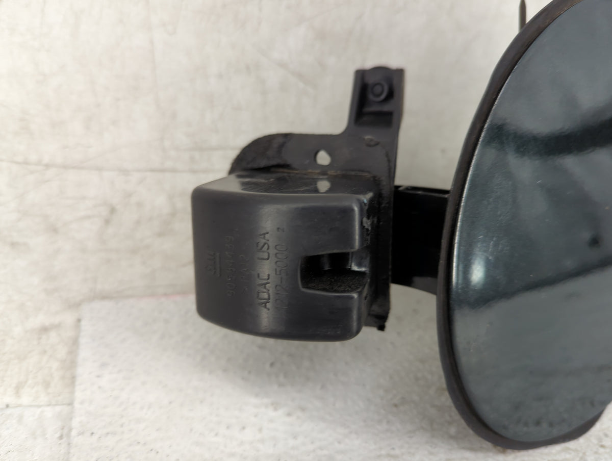 2002 Saturn L300 Fuel Tank Door Lid Gas Tank Black - Oemusedautoparts1.com