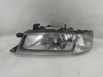 compare product 1999-2002 Suzuki Esteem Driver Left Oem Head Light Headlight Lamp
