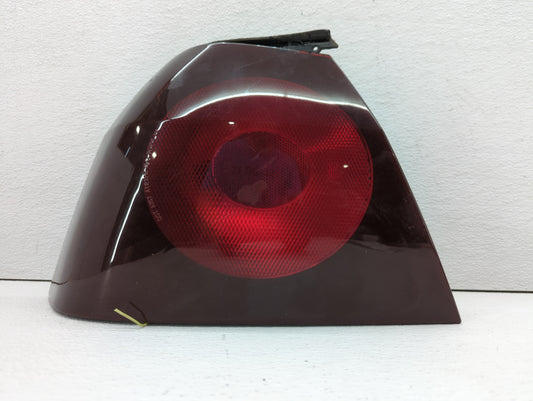 2002-2004 Chevrolet Impala Tail Light Assembly Driver Left OEM P/N:16525261 Fits Fits 2002 2003 2004 OEM Used Auto Parts - O