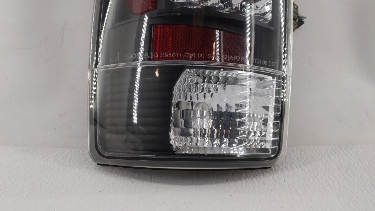 2000-2003 Chevrolet Suburban 1500 Tail Light Assembly Driver Left OEM P/N:GM150-U1RW2 42012159 Fits Fits 2000 2001 2002 2003