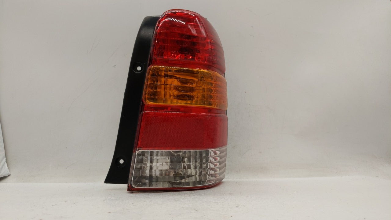 2001-2007 Ford Escape Tail Light Assembly Passenger Right OEM P/N:4L84-13B504-D Fits Fits 2001 2002 2003 2004 2005 2006 2007