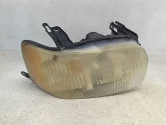 compare product 2001-2004 Ford Escape Passenger Right Oem Head Light Headlight Lamp