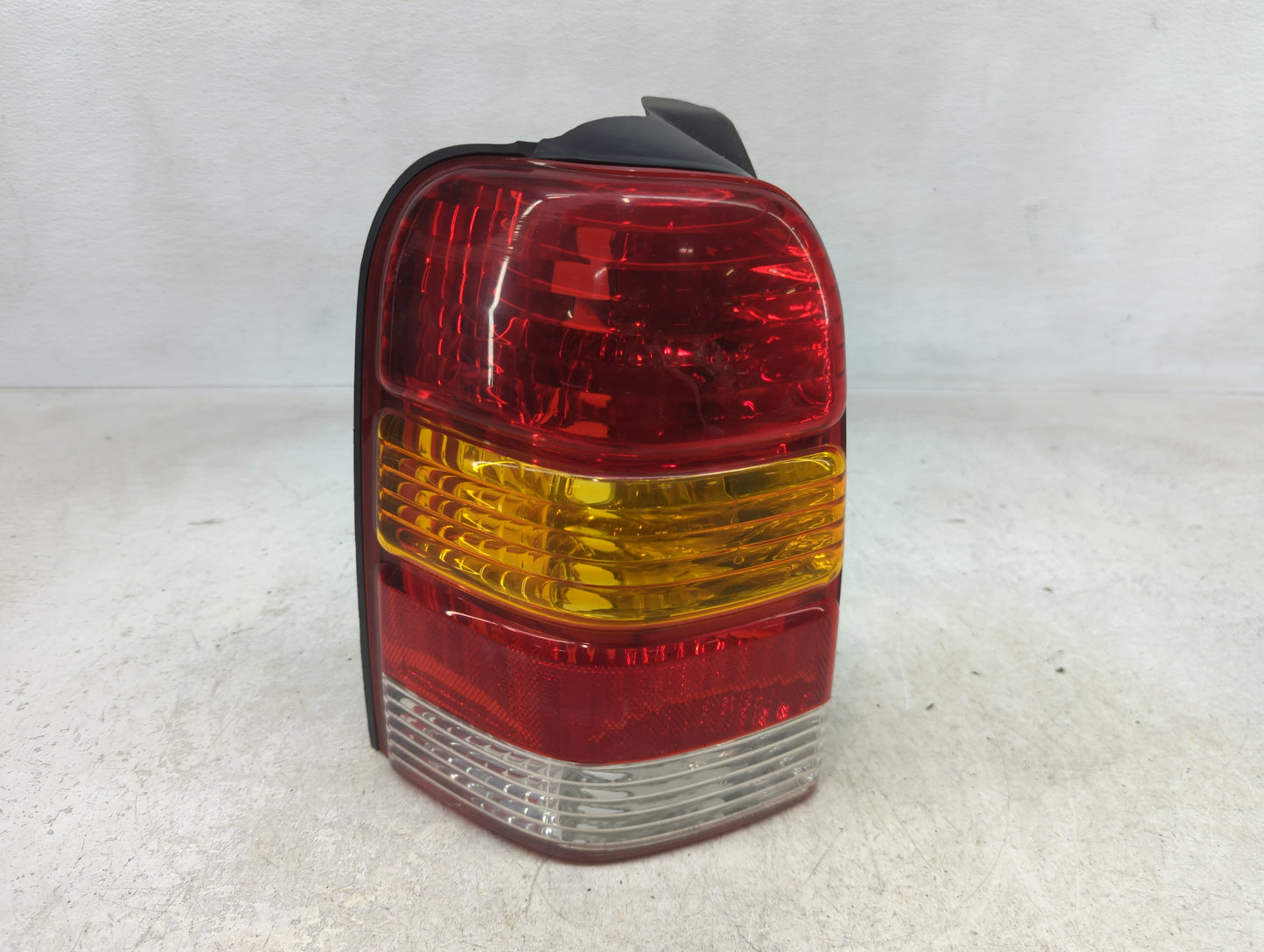 2001-2007 Ford Escape Tail Light Assembly Driver Left OEM Fits Fits 2001 2002 2003 2004 2005 2006 2007 OEM Used Auto Parts -
