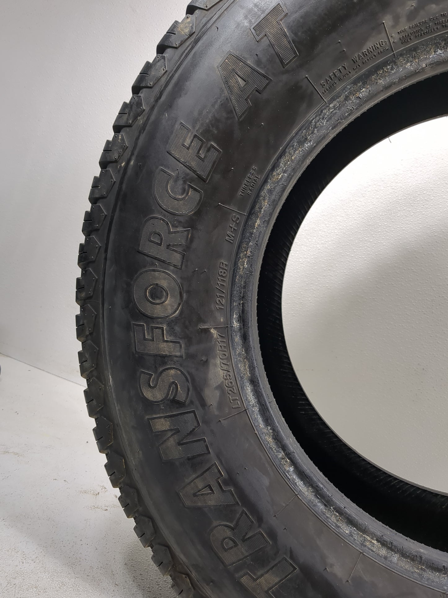 Used Tire 265/70R17 FIRESTONE TRANSFORCE AT 121R - Tread Depth 8/32 - Oemusedautoparts1.com